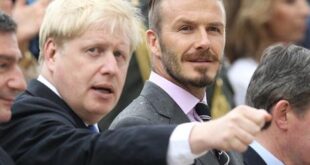Former England football captain David Beckham, right, and London Mayor Boris Johnson attend a handover for the Olympic flame at Panathenaean stadium in Athens, Thursday, May 17, 2012. (AP Photo/Thanassis Stavrakis)