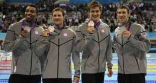 From left, United States' Cullen Jones, United States' Ryan Lochte, United States' Nathan Adrian and United States' Michael Phelps pose with their silver medals for the men's 4x100-meter freestyle relay final at the Aquatics Centre in the Olympic Park during the 2012 Summer Olympics in London, Sunday, July 29, 2012. (AP Photo/Mark J. Terrill)