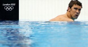Michael Phelps of the U.S. reacts after taking third place in his men's 200m butterfly heat at the London 2012 Olympic Games at the Aquatics Centre July 30, 2012. (REUTERS/David Gray)