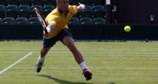 Australia's Lleyton Hewitt returns the ball during a training session at the All England Lawn Tennis Club before the start of the London 2012 Olympic Games in London July 25, 2012. REUTERS/Stefan Wermuth