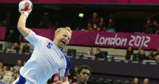 Iceland's leftback Ingimundur Ingimundarson jumps to shoot during the men's preliminaries Group A handball match Tunisia vs Iceland for the London 2012 Olympics Games on July 31, 2012 at the Copper Box hall in London. (AFP PHOTO/ JAVIER SORIANO)
