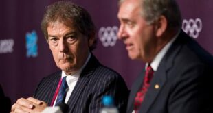 Director General of the World Anti-Doping Agency David Howman, left, and President of the World Anti-Doping Agency John Fahey at a press conference in the Media Centre of the Olympic Park in east London on July 25, 2012. AFP PHOTO/LEON NEAL