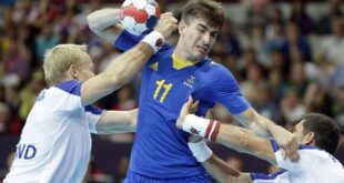 Dalibor Doder of Sweden (11) is stopped by Ingimundur Ingimundarson, left, and Alexander Petersson of Iceland during their men's handball preliminary match at the 2012 Summer Olympics, Thursday, Aug. 2, 2012, in London.