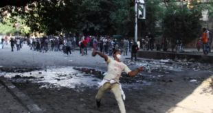 Egyptian protesters clash with security forces, not pictured, near Tahrir Square in Cairo, Egypt, Sunday, Nov. 25, 2012. President Mohammed Morsi edicts, which were announced on Thursday, place him above oversight of any kind, including that of the courts. AP