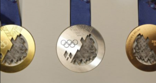 Medals for the 2014 Winter Olympic Games in Sochi are seen on display during a presentation in St. Petersburg May 30, 2013. REUTERS/Alexander Demianchuk