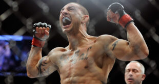 Cub Swanson towers over Dennis Siver during their featherweight bout at the MGM Grand Garden Arena on July 6.
